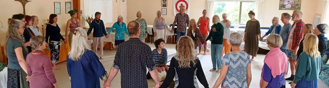 Dances of Universal Peace retreat 2022. Prim singing inside circle
