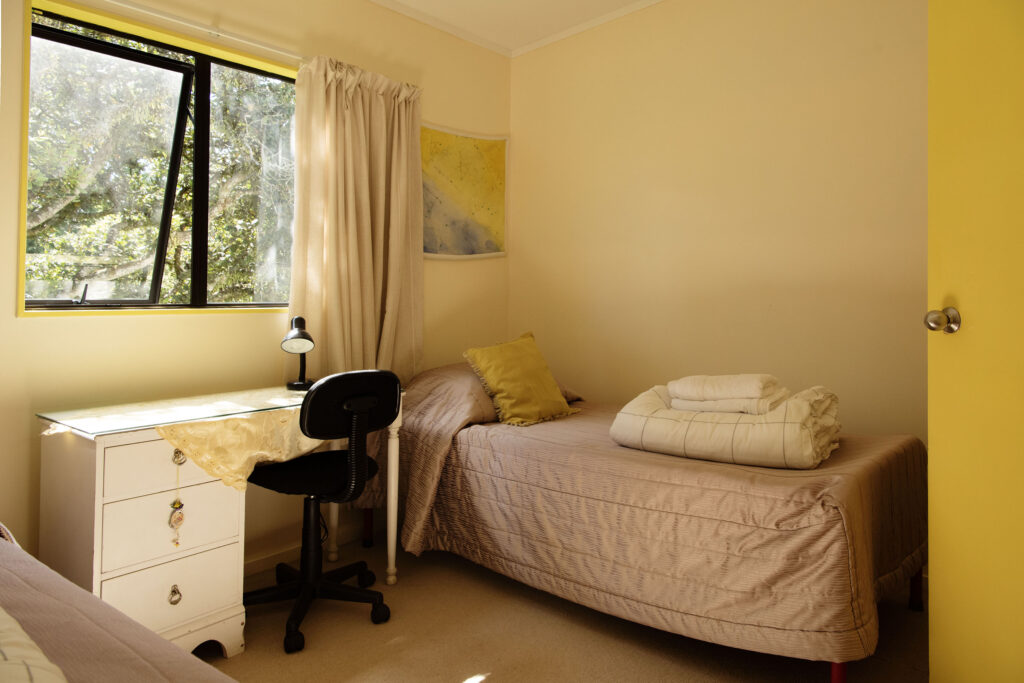 Yellow Room, with linen provided on the bed.